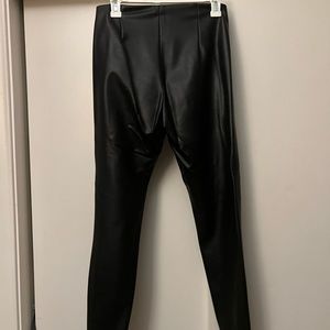 Women’s black pleather pants.